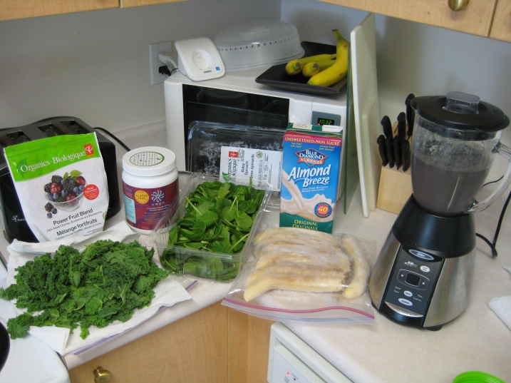 smoothie ingredients - kale, spinach, berries, almond milk