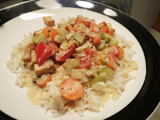 cooked thai green curry plated with white rice